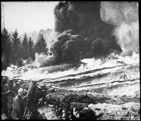 French soldiers making a gas and flame attack on German trenches in ...