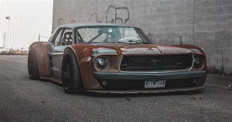 This Slammed 1967 Ford Mustang Hot Rod Hides A Secret Beneath Its Wide Body