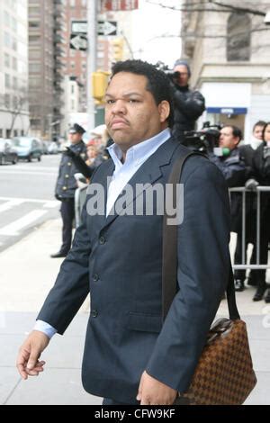 Luis Falcon, Celia Cruz's adopted son, arriving to the Pedro Knight's wake at Frank E. Campbell ...