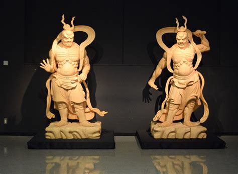 A pair of reproduced Nio statues, part of a restoration/reconstruction effort in Enkakuji ...