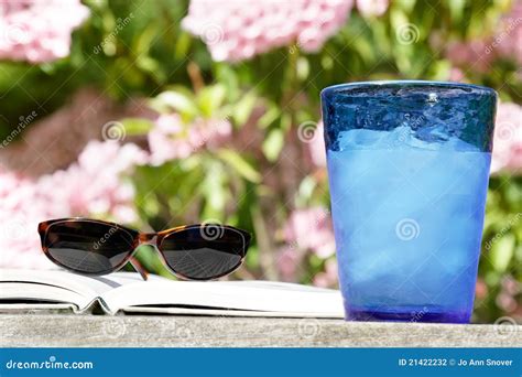 Summer reading outside stock photo. Image of water, bright - 21422232