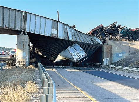 Train derailment collapses bridge, killing truck driver | News, Sports ...