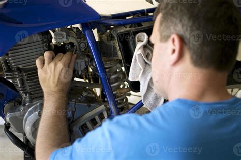 Motorcycle Repair 735472 Stock Photo at Vecteezy