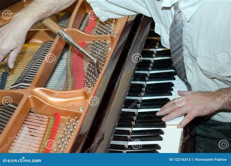 Piano tuning stock image. Image of keyboard, conformity - 12216313