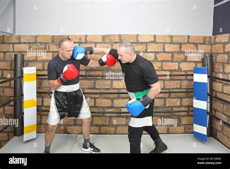 Boxers Sparring Practice Training in Boxing Ring Stock Photo - Alamy