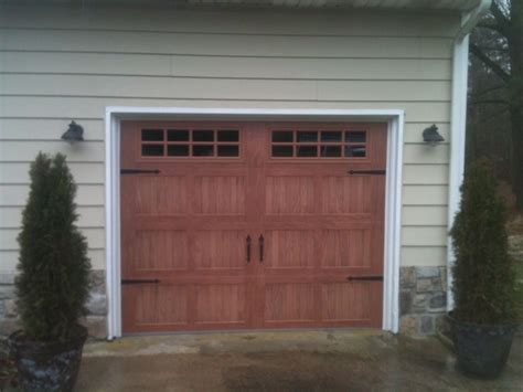 Here we installed a CHI Model #5283 Stamped Steel Carriage House Door, Insulated with Steel ...