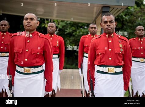 Members from the Republic of Fiji Military Forces Quarter Guard stand ...