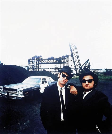 DAN AYKROYD and JOHN BELUSHI in THE BLUES BROTHERS -1980-. Photograph by Album - Pixels