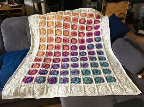 Sunburst granny square blanket! Super happy with the colour gradient ...