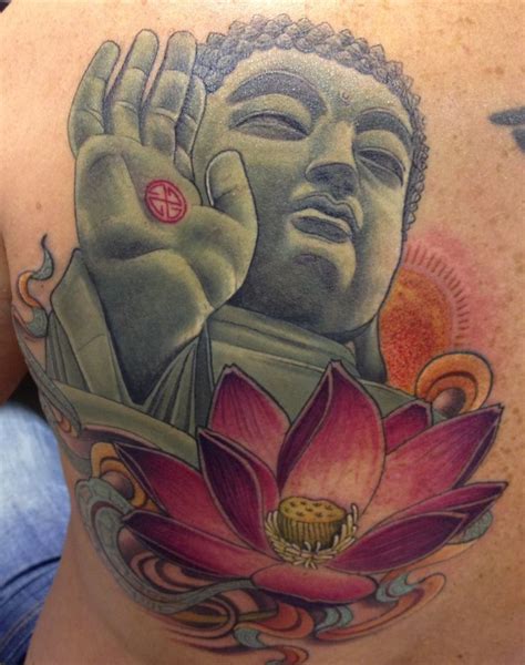 Buddhist Tattoos | Tattoobite. | Tattoos | Buddha tattoos, Lotus tattoo ...