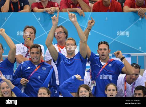 France's Alain Bernard and Hugues Duboscq celebrate Camille Muffat Gold ...