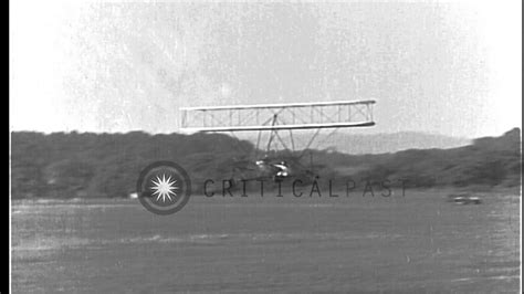 Ultralight biplane takes off, flies, and lands during flight testing in United St...HD Stock ...