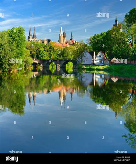 Merseburg Cathedral and Merseburg Castle are reflected in the River ...