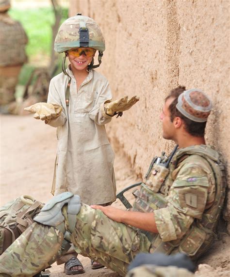 Afghanistan - I don't know if it says "war is fun" or "a uniform makes us all the same ...