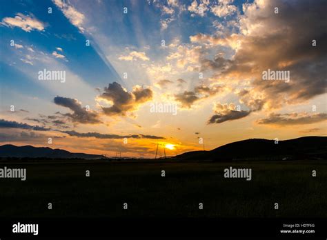 Amazing clouds at the sunset Stock Photo - Alamy