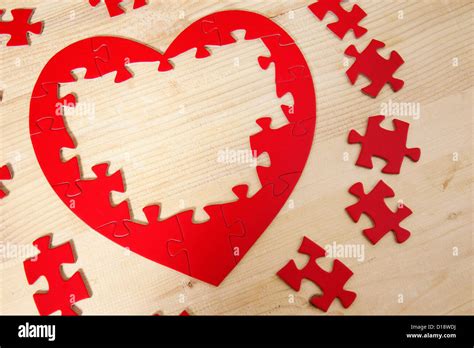 Heart shaped jigsaw puzzle Stock Photo - Alamy