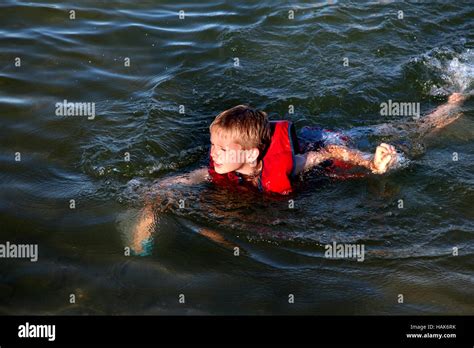 Kids Swimming In Lake High Resolution Stock Photography and Images - Alamy