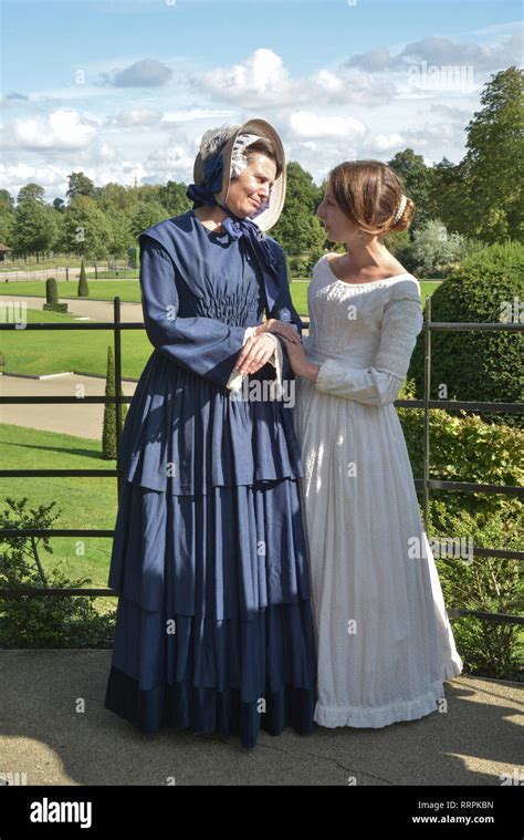 Two modern day women in historically accurate Victorian dress walk ...