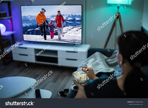 Woman Watching Tv On Couch Sofa Stock Photo 1760535698 | Shutterstock