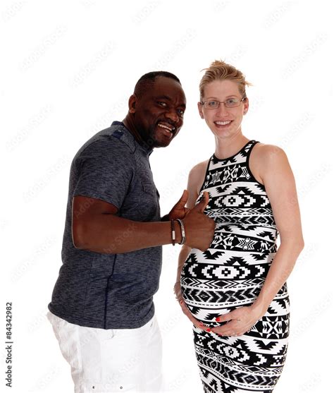 Happy white woman pregnant, black man. Stock Photo | Adobe Stock