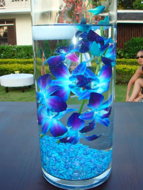 Blue Dendrobium Orchids Submerged in Water for Wedding Decor