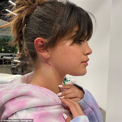 Selena Gomez sports painful neck tattoo as she pays tribute to new album Rare - ReadSector