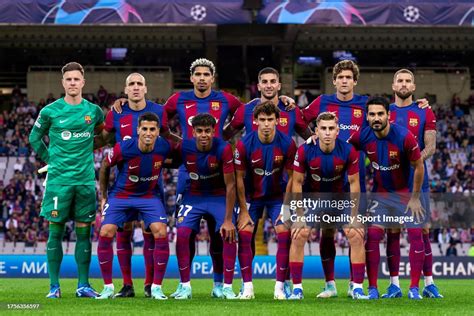 Players of FC Barcelona poses for a team's line up photo ahead the ...