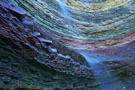 Stratified rock segments with waterfall; Stoney Creek, Ontario, Canada - Stock Photo - Dissolve