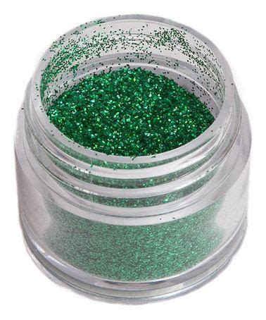 green glitter in a small jar on a white background