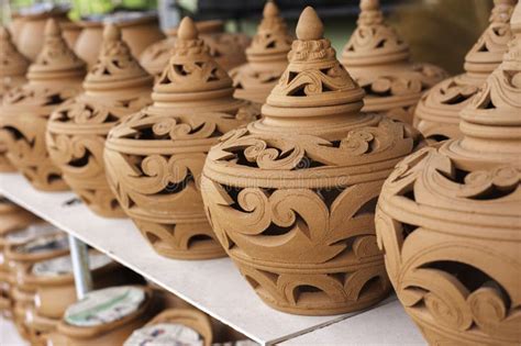 Carving Clay,Thai Traditional Clay Pottery, Selective Focus, Blu Stock Photo - Image of stall ...