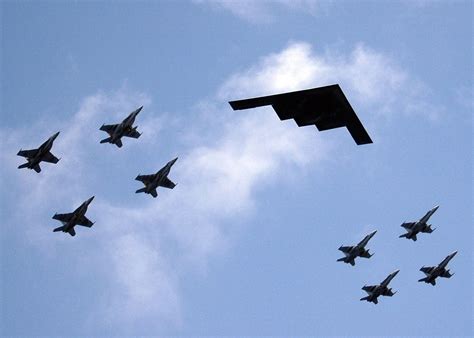 A B-2 Stealth Bomber from Whiteman AFB in Missouri leads an aerial ...