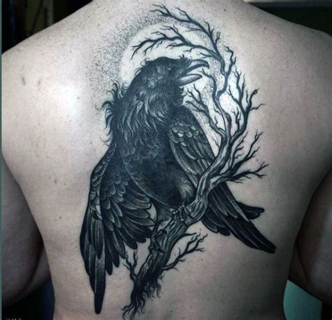 Hairy Dark Raven On A Twig Tattoo Male Back | Raven tattoo, Crow tattoo ...