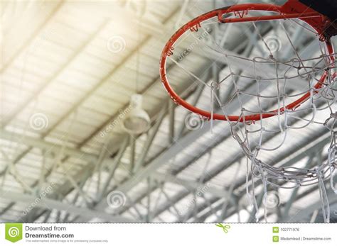 Old Orange Basketball Hoop with White Net in Indoor Gymnasium Sp Stock ...