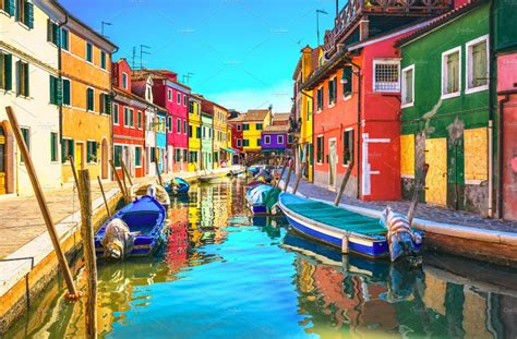 Venice landmark, Burano island canal, colorful houses and boats, Italy. Stock Photo for Sale ...