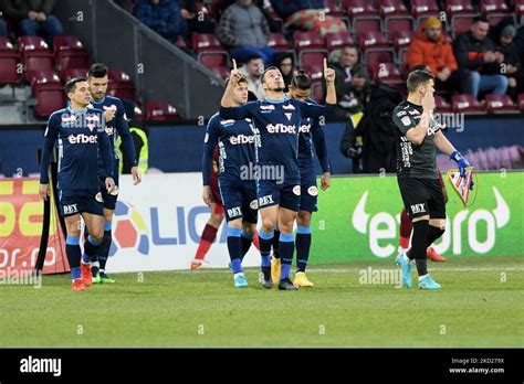 Players of UTA Arad entering on the pitch at the beginning of the game ...