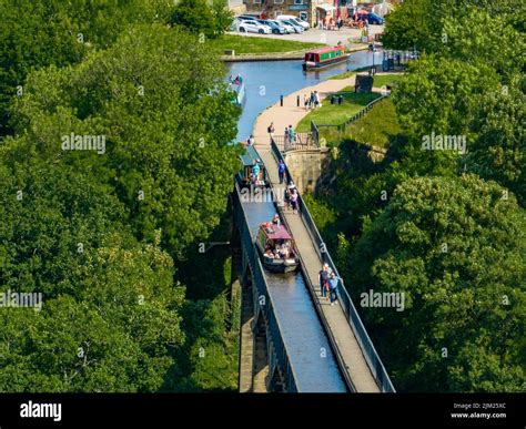 Canal Boats Crossing Pontcysyllte Aqueduct aerial view at a very busy morning in Wales, UK Drone ...