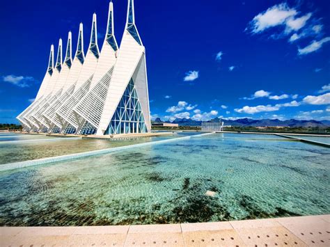 100+ Free Photos - Jin Fei Centre - A curious building surrounded by water