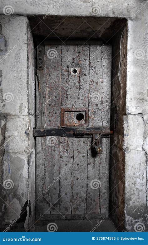 Old prison cell door stock image. Image of hole, cell - 275874595