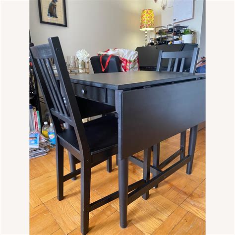 IKEA Drop-leaf Dining Table and Two Chairs - AptDeco