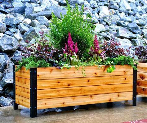 I built these simple yet beautiful modern planter boxes using Cedar ...