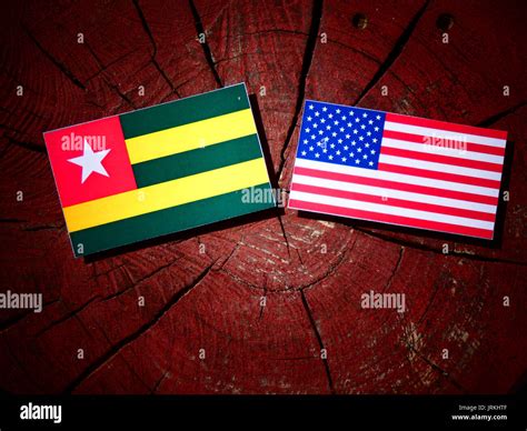 Togolese flag with USA flag on a tree stump isolated Stock Photo - Alamy