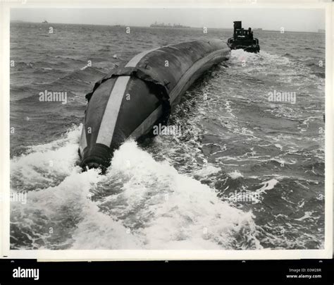 Dec. 12, 1960 - Bending barges grown bigger.: Full of air for demonstration purposes, the 100ton ...