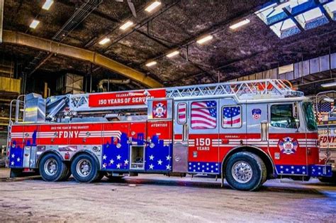 the fire truck is painted red, white and blue