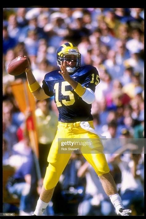 Quarterback Elvis Grbac of the Michigan Wolverines prepares to pass... News Photo - Getty Images
