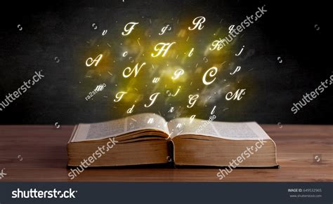 Glowing Yellow Alphabet Letters Coming Out Stock Photo (Edit Now) 649532965