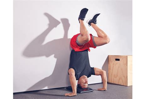 The Exercise Progressions That'll Help You Nail Handstand Pushups