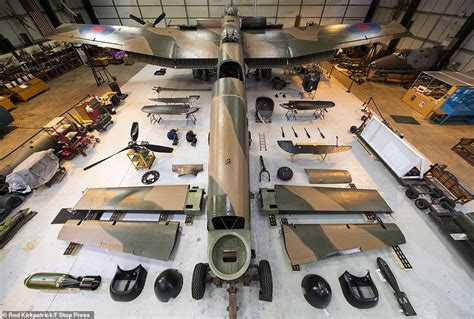 Engineers lay out parts of WWII Lancaster bomber like a giant AIRFIX model | Daily Mail Online