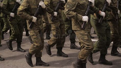 Soldiers Marching in a Parade through the Town, Military Marching of Soldiers in the City in ...