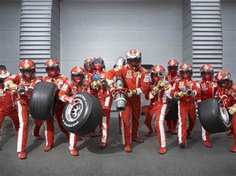 How much does a Formula 1 pit crew member earn?