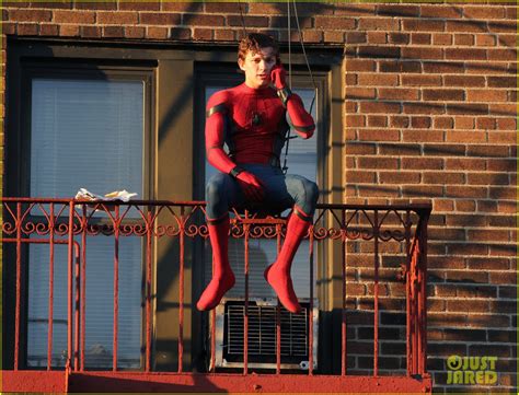 Full Sized Photo of tom holland performs his own spider man stunts on ...